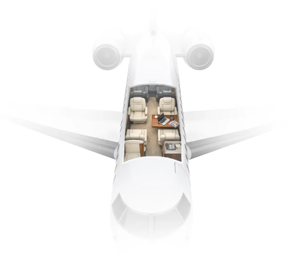 Top-down view of a private jet showing its interior layout, including cream-colored seats, a table with magazines, and a sofa. The exterior of the plane is partially faded.